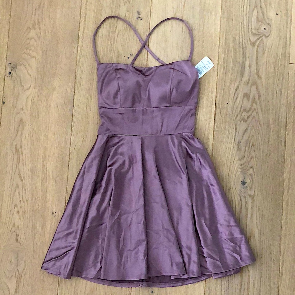 Satin mini- dress with cross laces on back perfect for any occasion 💜